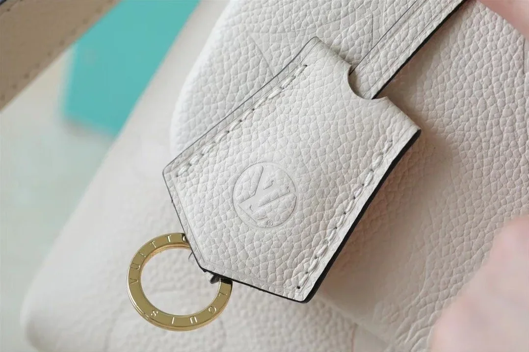 Louis Vuitton Madeleine BB Monogram Empreinte Creme Beige Louis Vuitton Madeleine BB Monogram Empreinte Creme Beige