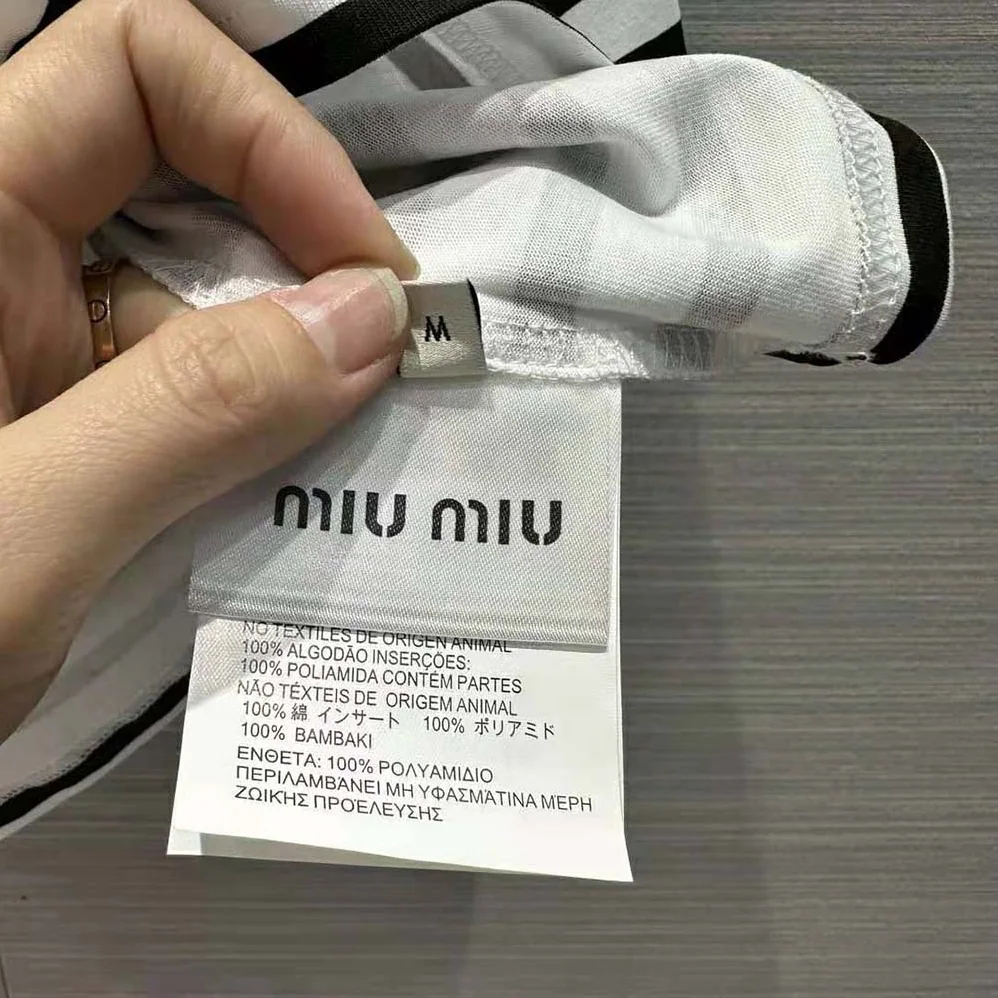 Miu Miu Cotton T-shirt with Printed Logo for Women in Black Miu Miu Cotton T-shirt with Printed Logo for Women in Black