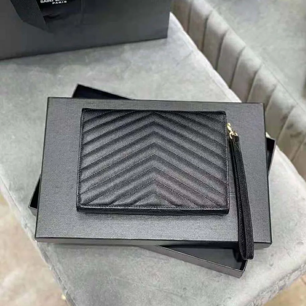 Saint Laurent YSL Monogram Clutch in Quilted Grain de Poudre Embossed Leather for Women in Black Saint Laurent YSL Monogram Clutch in Quilted Grain de Poudre Embossed Leather for Women in Black