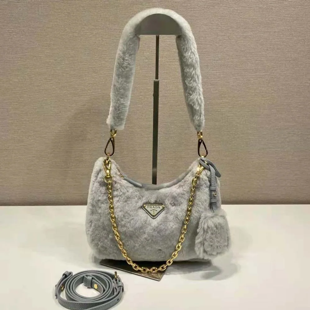 Prada Shearling Mini-Bag with the Enameled Metal Triangle Logo for Women in Silver