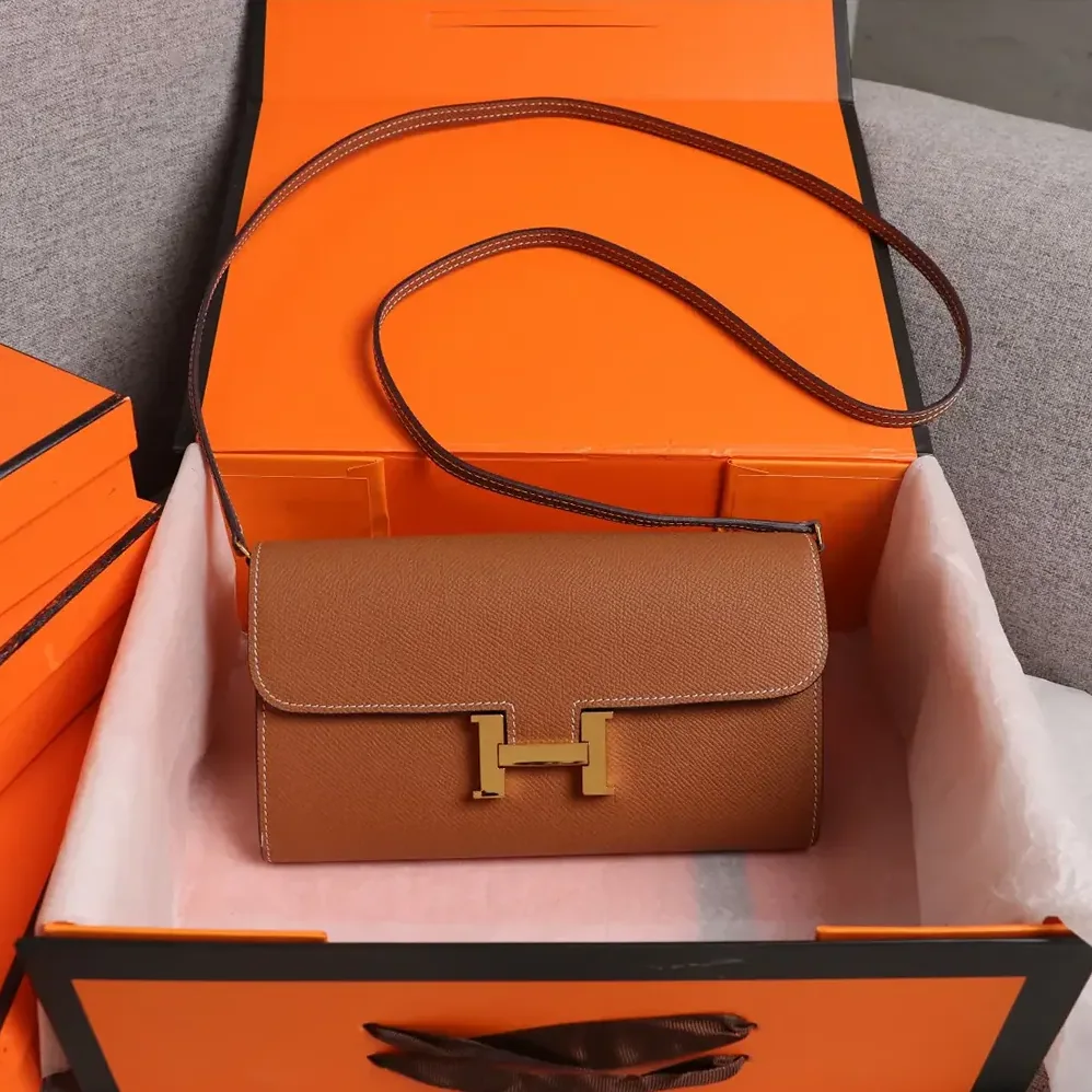 Hermes Constance Long To Go in Epsom Leather for Women in Brown/Gold