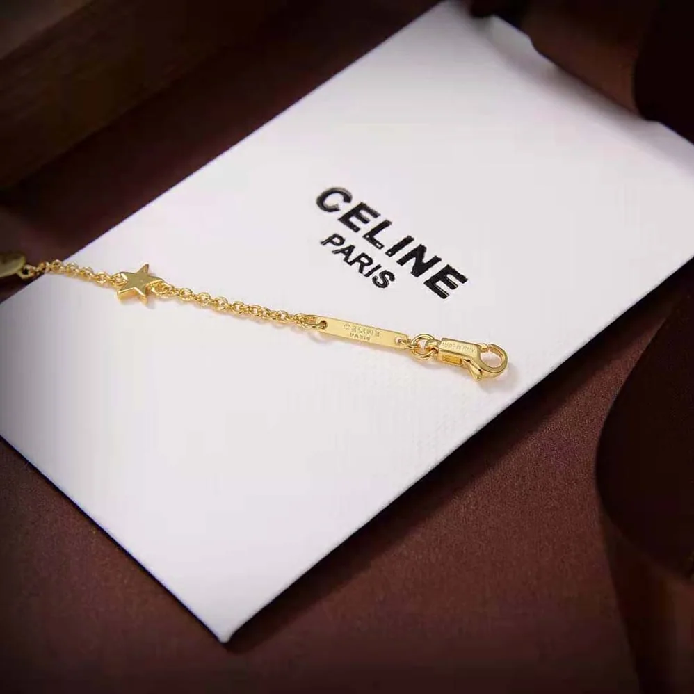 Celine Maillon Triomphe Multi Motifs Bracelet in Brass with Gold Finish for Women