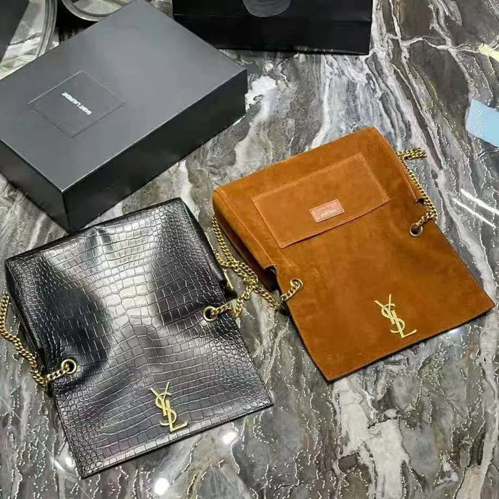 Saint Laurent YSL Kate Medium Reversible in Suede and Crocodile for Women in Embossed Leather Saint Laurent YSL Kate Medium Reversible in Suede and Crocodile for Women in Embossed Leather