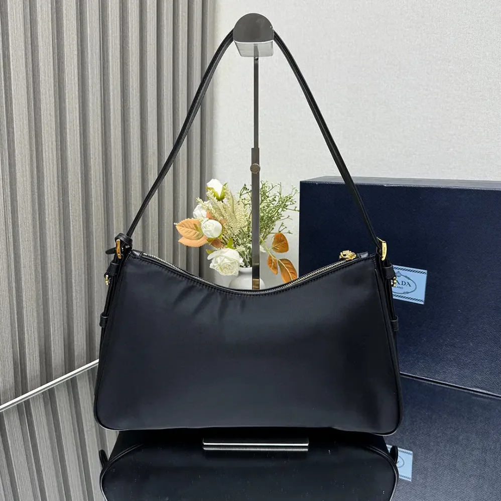 Prada Aimée large Re-Nylon and Leather Shoulder Bag with Padlock for Women Prada Aimée large Re-Nylon and Leather Shoulder Bag with Padlock for Women