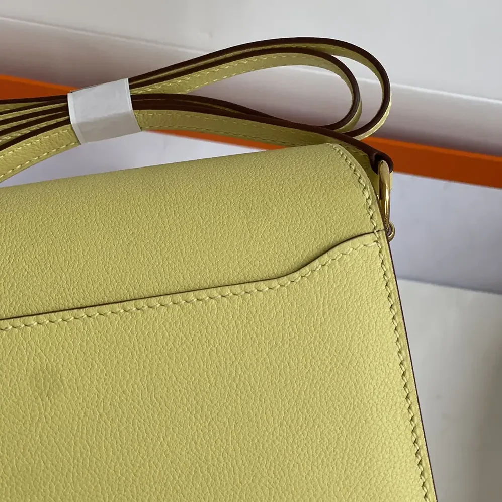 Hermes Roulis Mini Bag in Evercolor Calfskin for Women in Yellow/Silver