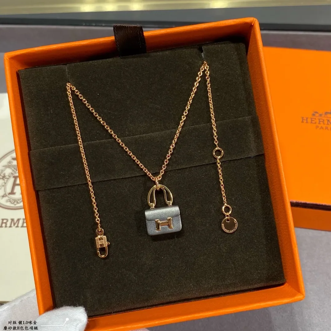 Hermes Constance Amulets Pendant Necklace Gold Tone Hermes Constance Amulets Pendant Necklace Gold Tone
