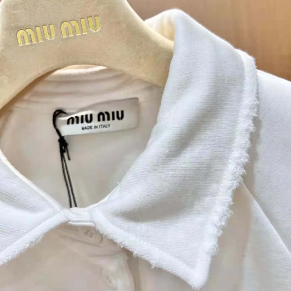 Miu Miu Cotton Polo Sweatshirt with Embroidered Logo for Women in White Miu Miu Cotton Polo Sweatshirt with Embroidered Logo for Women in White