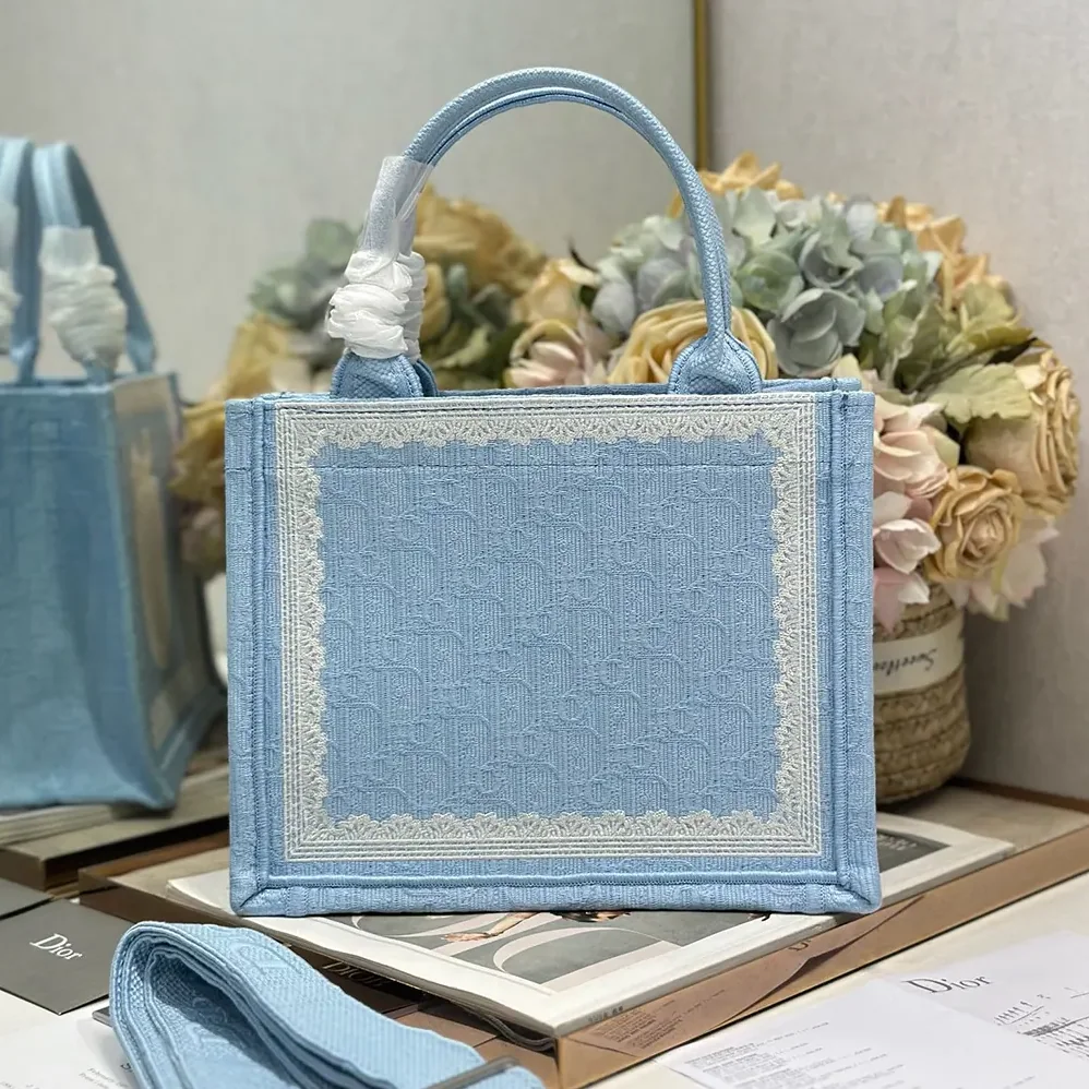 Dior Small Dior Book Tote with Strap Celestial Blue Dior Oblique Embroidery with White Lace and Dior Médaillon for Women Dior Small Dior Book Tote with Strap Celestial Blue Dior Oblique Embroidery with White Lace and Dior Médaillon for Women