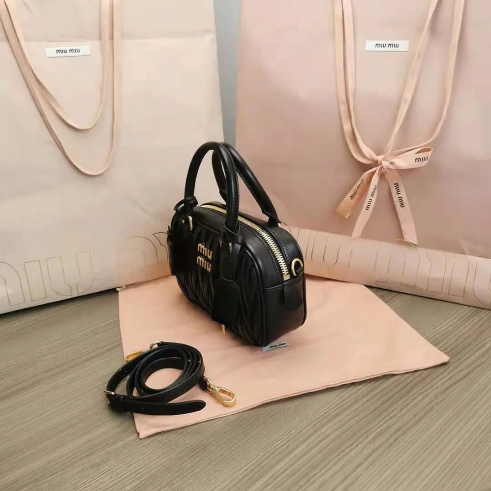 Miu Miu Matelassé Nappa Leather Top-Handle Bag for Women in Black