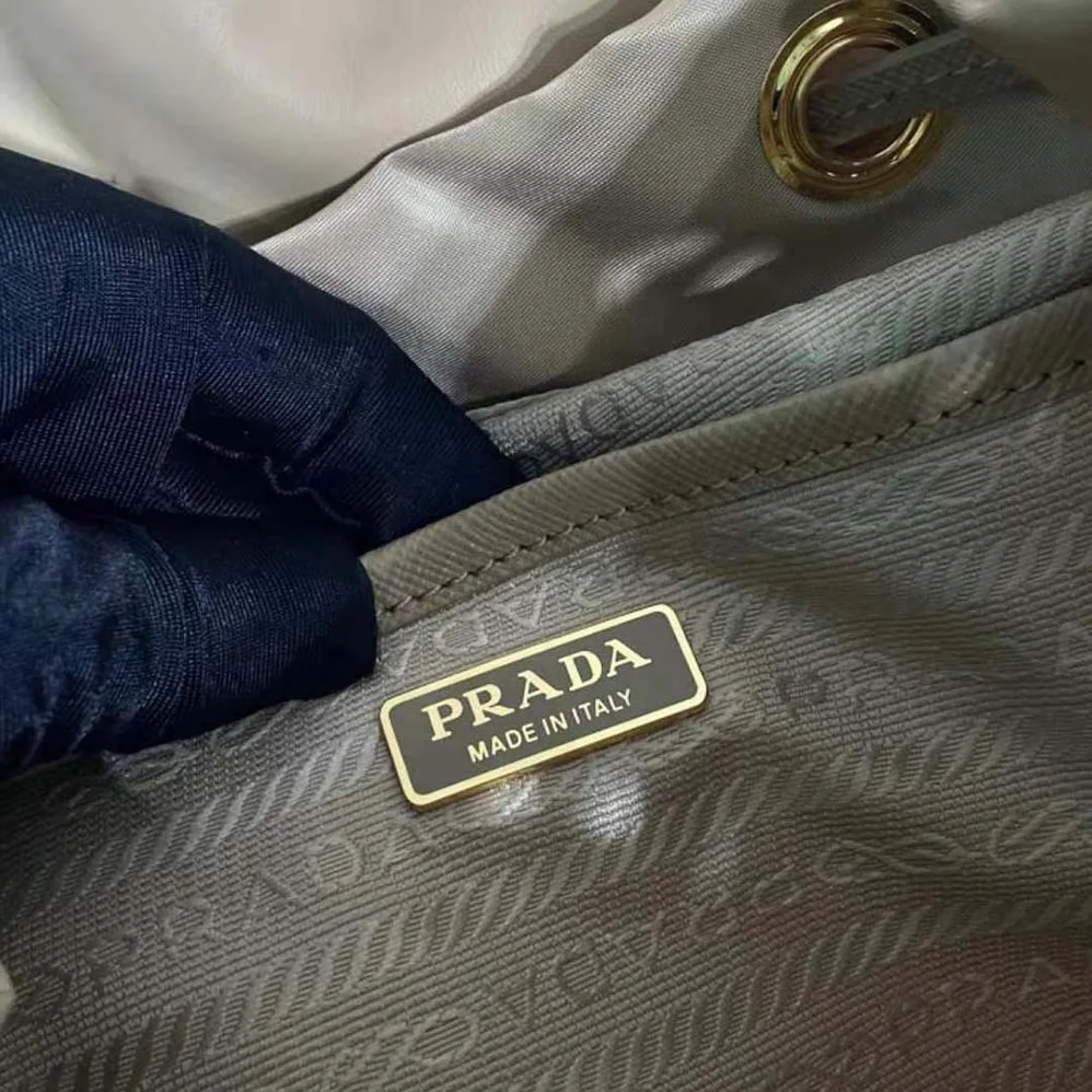 Prada Re-Nylon and Shearling Backpack for Women in Beige