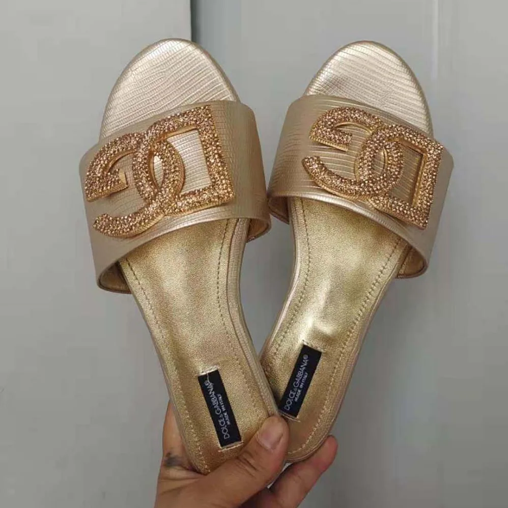 Dolce Gabbana D&G Foiled Iguana-Print Calfskin Slides with Rhinestone for Women in Detailed DG Logo Dolce Gabbana D&G Foiled Iguana-Print Calfskin Slides with Rhinestone for Women in Detailed DG Logo
