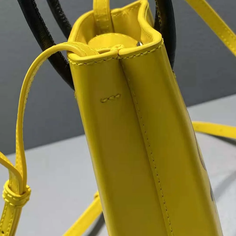 Balenciaga the Simpsons Tm 20th Television Mini Shopping Bag in Shiny Box Calfskin in Yellow for Women Balenciaga the Simpsons Tm 20th Television Mini Shopping Bag in Shiny Box Calfskin in Yellow for Women