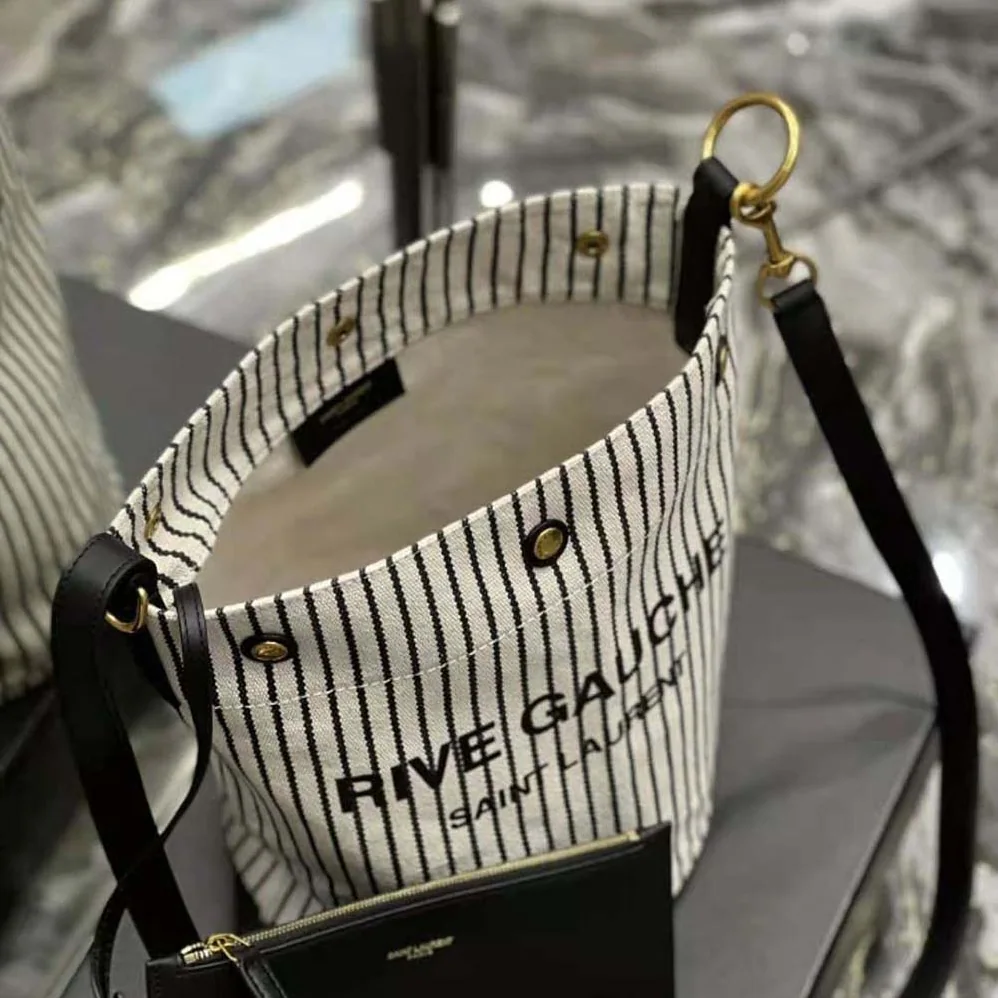Saint Laurent YSL Rive Gauche Bucket Bag in Striped Canvas and Leather for Women Saint Laurent YSL Rive Gauche Bucket Bag in Striped Canvas and Leather for Women