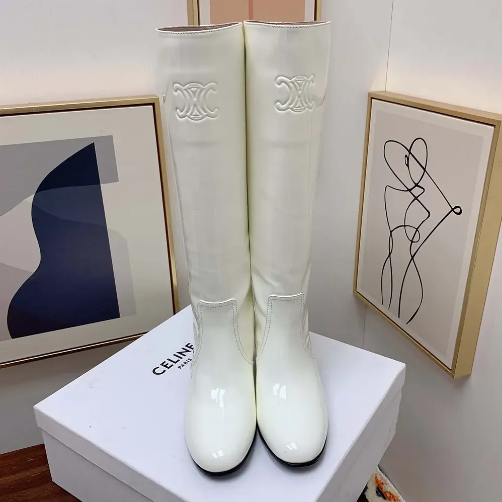 Celine Les Bottes Celine Triomphe High Boot in Patent Calfskin for Women in White