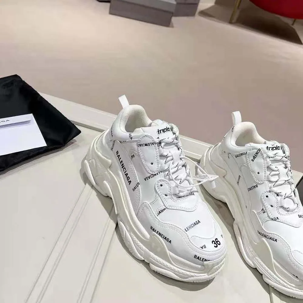 Balenciaga Triple S Sneaker Allover Logo in White and Black Technical Material for Unisex Balenciaga Triple S Sneaker Allover Logo in White and Black Technical Material for Unisex