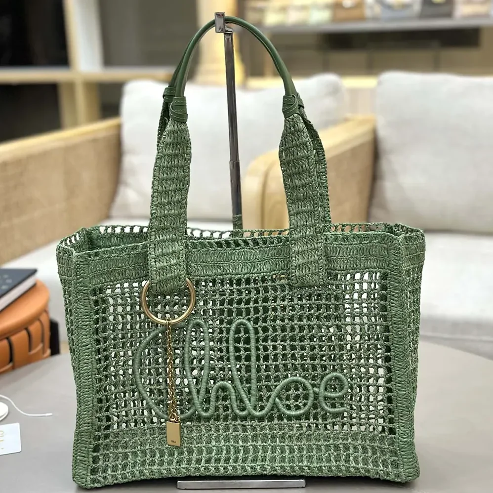 Chloe Summer Banana East-west Tote Bag in Raffia & Buffalo Leather for Women Chloe Summer Banana East-west Tote Bag in Raffia & Buffalo Leather for Women