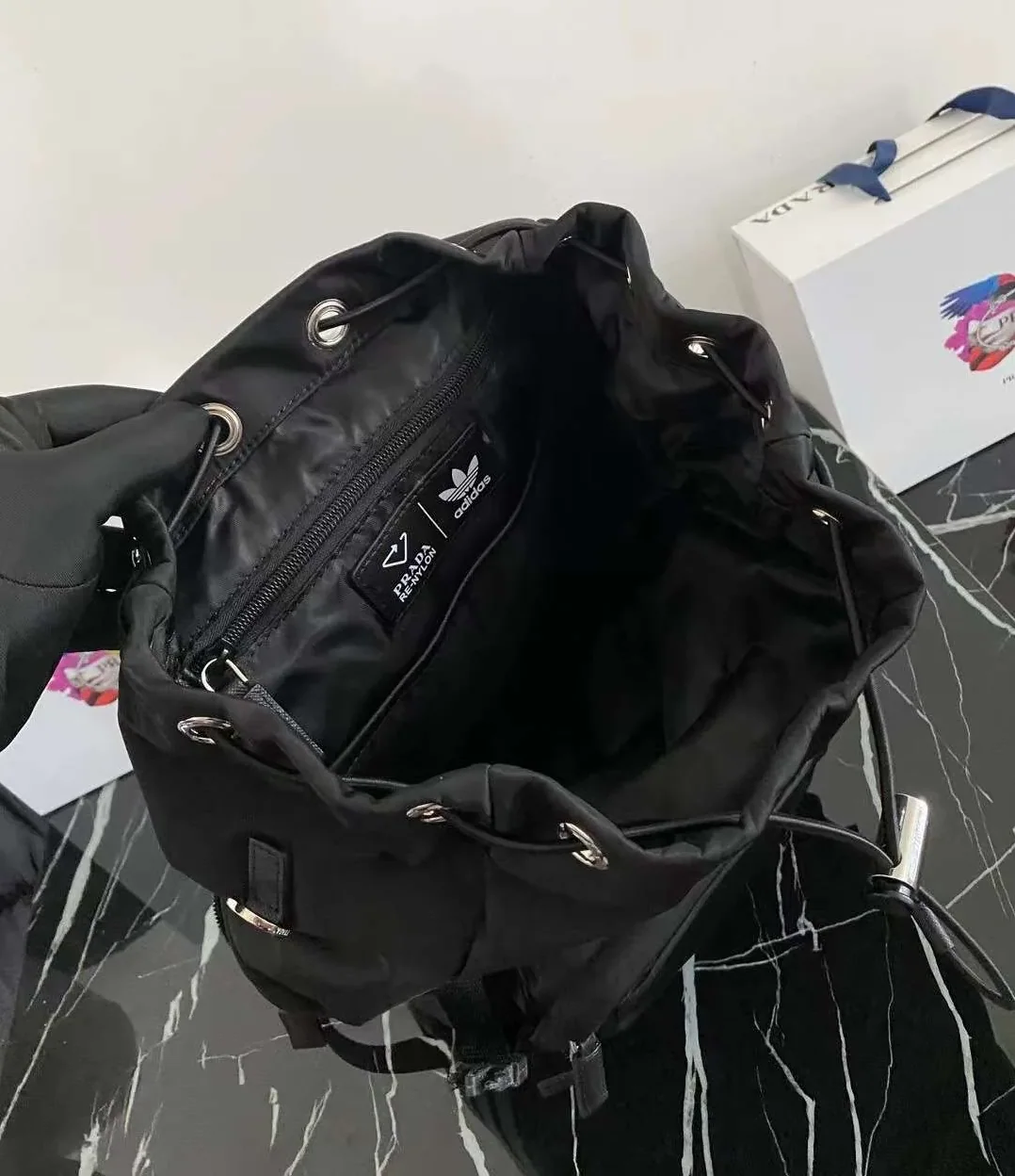 Prada Re-Nylon And Saffiano Backpack Black / 2VZ135_2DMG_F0002_V_HOL Prada Re-Nylon And Saffiano Backpack Black / 2VZ135_2DMG_F0002_V_HOL
