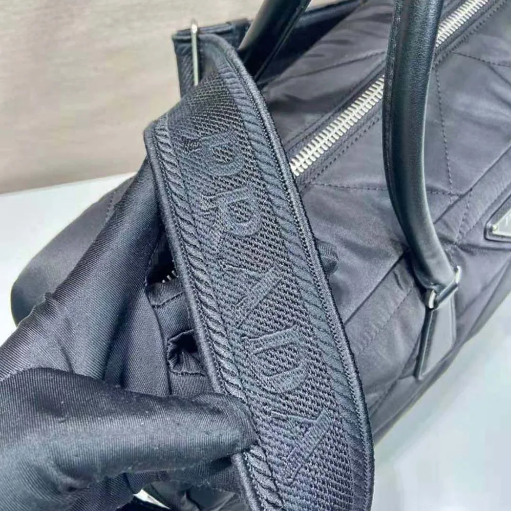 Prada Quilted Re-Nylon Travel Bag for Unisex in Black