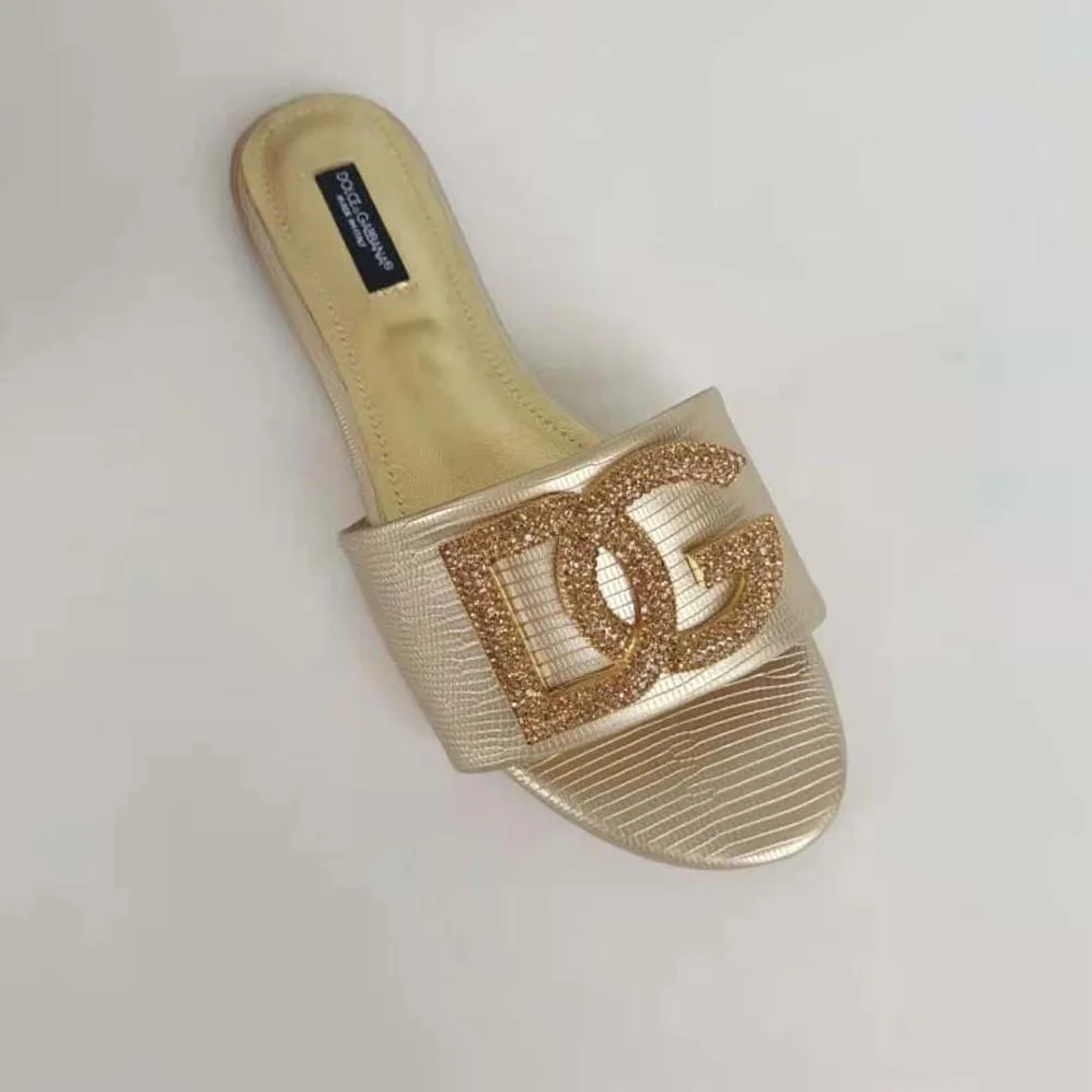 Dolce Gabbana D&G Foiled Iguana-Print Calfskin Slides with Rhinestone for Women in Detailed DG Logo Dolce Gabbana D&G Foiled Iguana-Print Calfskin Slides with Rhinestone for Women in Detailed DG Logo