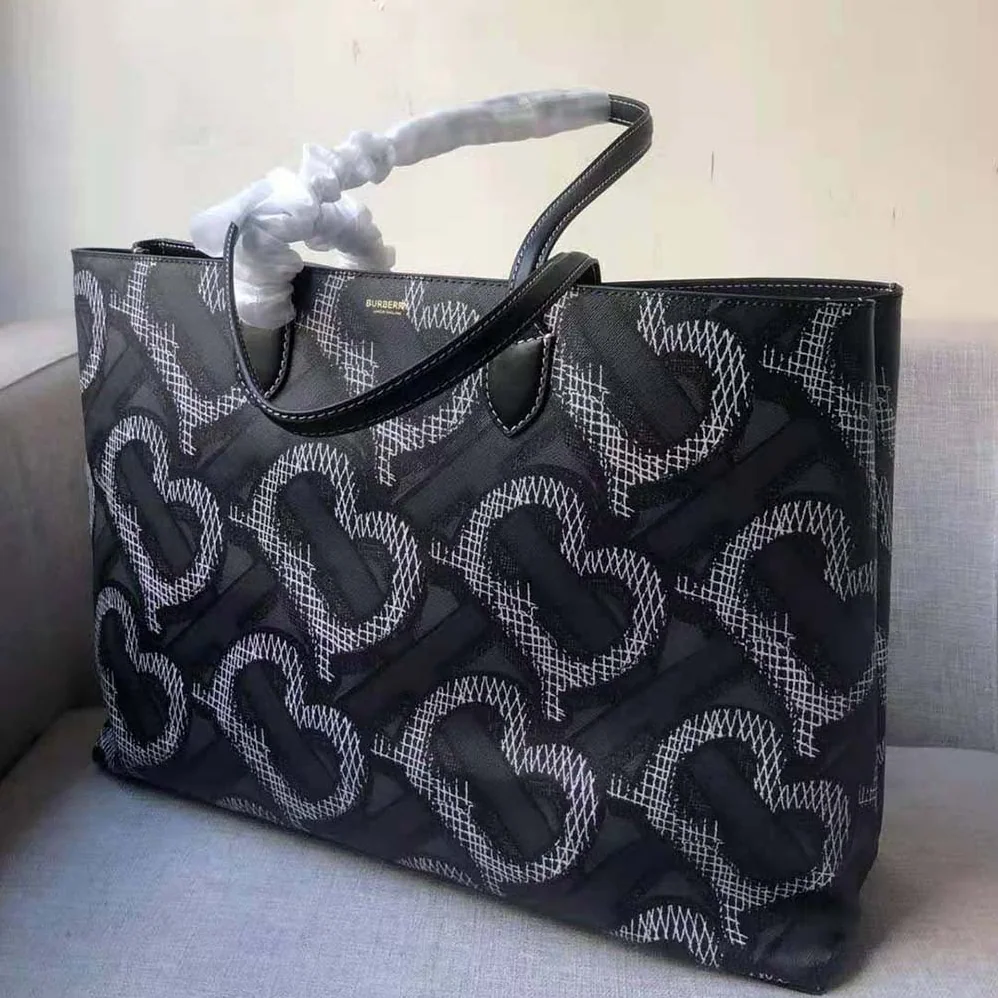 Burberry Monogram Print E-canvas Tote Bag for Women in Black Burberry Monogram Print E-canvas Tote Bag for Women in Black