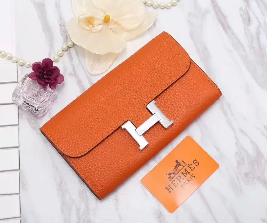 Hermes Constance Togo Long Wallet in Silver Toned Hardware Orange Hermes Constance Togo Long Wallet in Silver Toned Hardware Orange