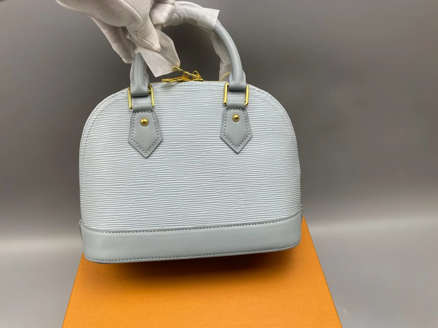 Louis Vuitton LV x TM Alma BB Top Handle Bag in Washed Blue Gold Hardware