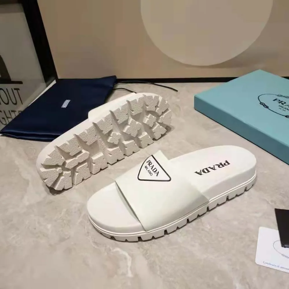 Prada Leather Slides in 20mm Heel for Women in White Prada Leather Slides in 20mm Heel for Women in White