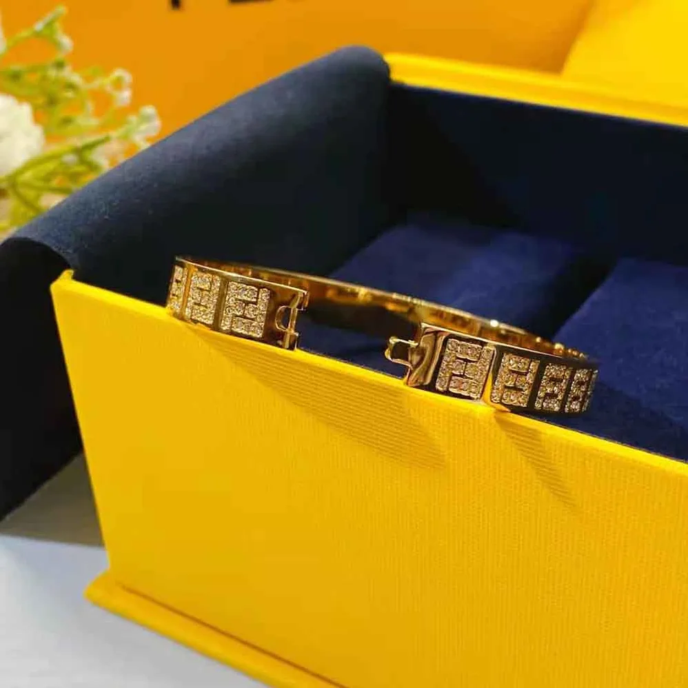 Fendi Stiff Narrow-Band FF Bracelet Gold for Women in colored Fendi Stiff Narrow-Band FF Bracelet Gold for Women in colored