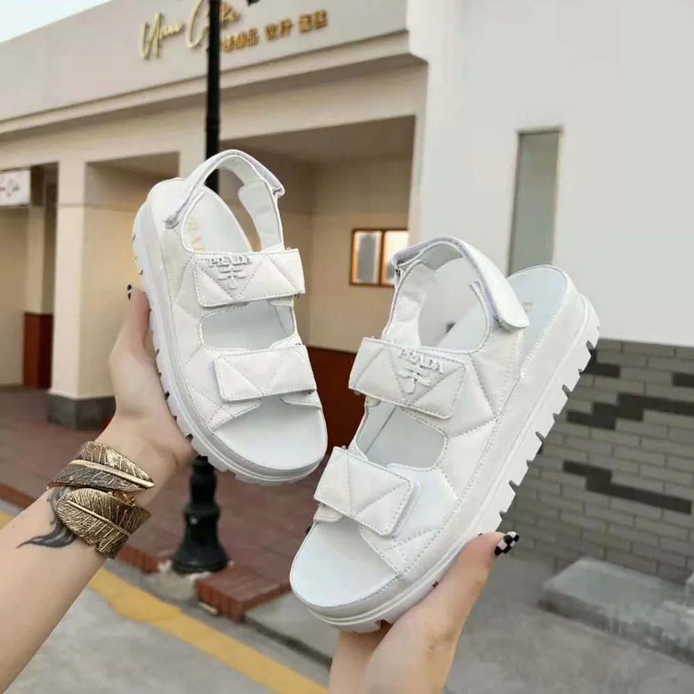 Prada Padded Nappa Leather Sandals for Women in White