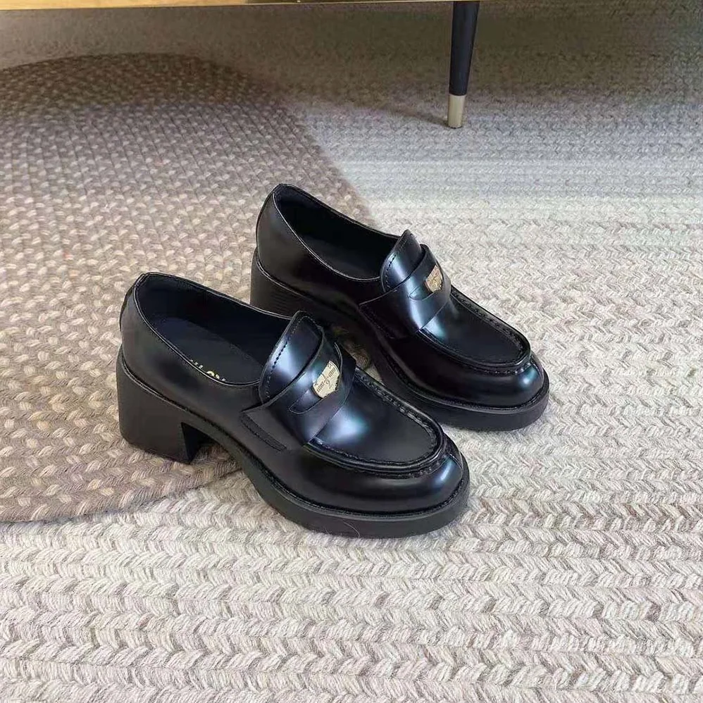 Miu Miu Leather Penny Loafers in 75mm Heel Height for Women in Black Miu Miu Leather Penny Loafers in 75mm Heel Height for Women in Black