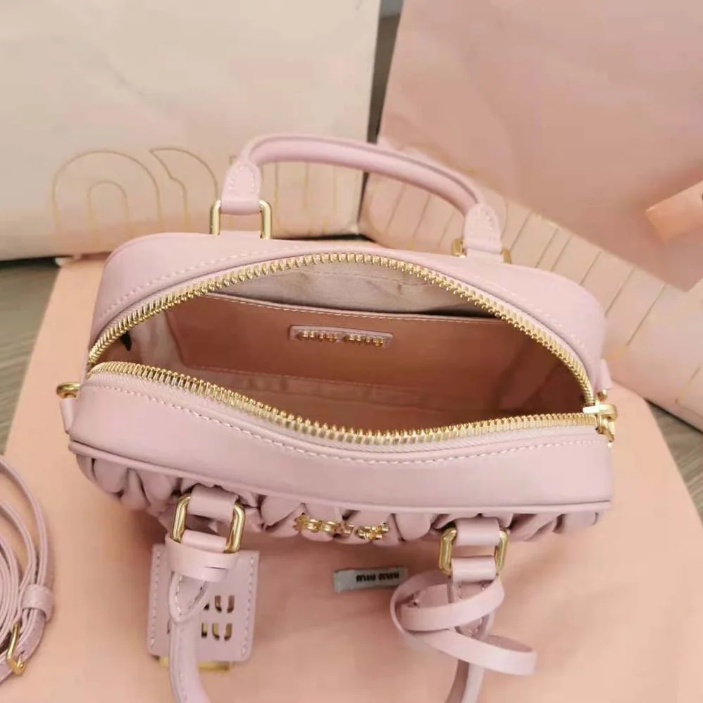 Miu Miu Matelassé Nappa Leather Top-Handle Bag for Women in Pink Miu Miu Matelassé Nappa Leather Top-Handle Bag for Women in Pink