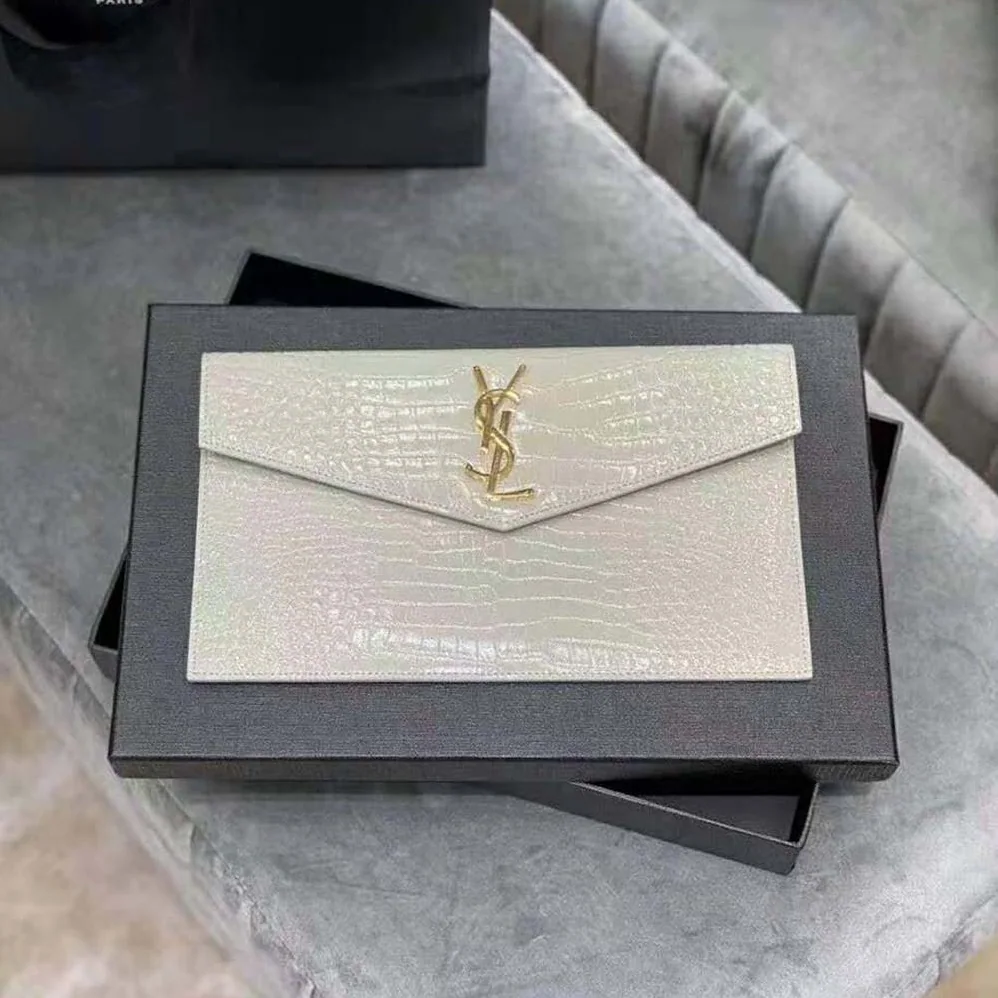 Saint Laurent YSL Uptown Pouch in Crocodile Embossed Shiny Leather for Women in Gold Saint Laurent YSL Uptown Pouch in Crocodile Embossed Shiny Leather for Women in Gold
