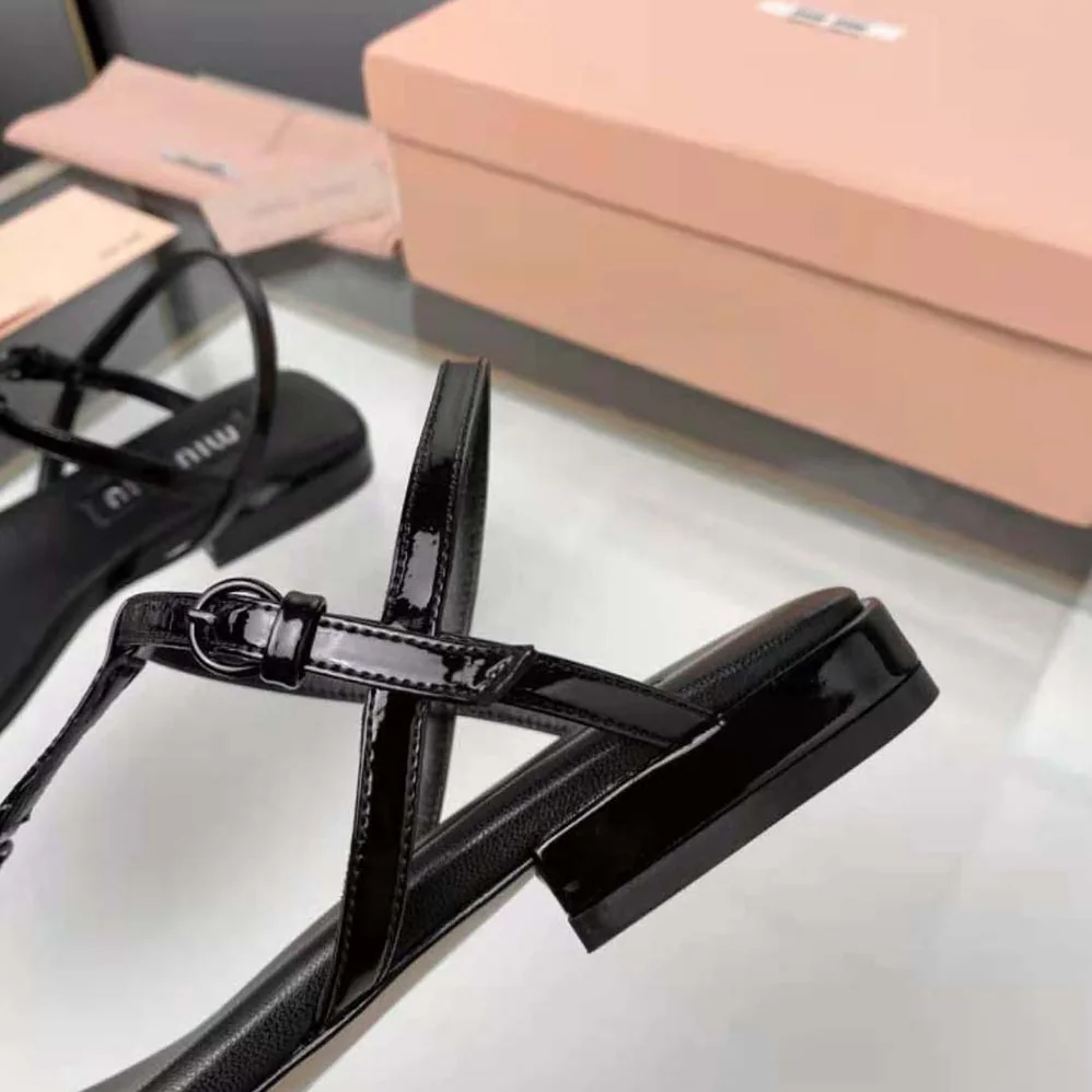 Miu Miu Patent Thong Sandals with Metal Lettering Logo for Women in Black Miu Miu Patent Thong Sandals with Metal Lettering Logo for Women in Black