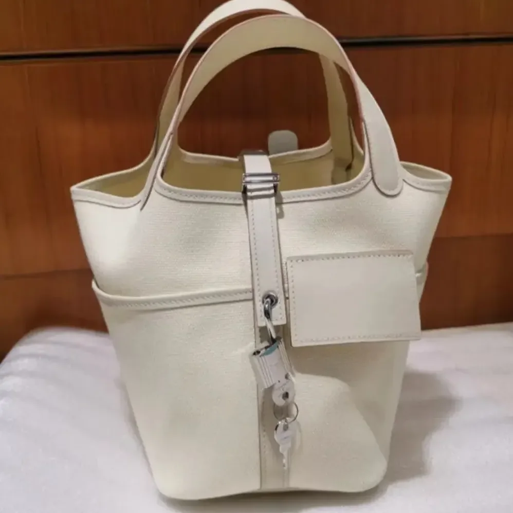 Hermes Picotin Lock 18 Pockets in Goeran Canvas Leather for Women in White Hermes Picotin Lock 18 Pockets in Goeran Canvas Leather for Women in White