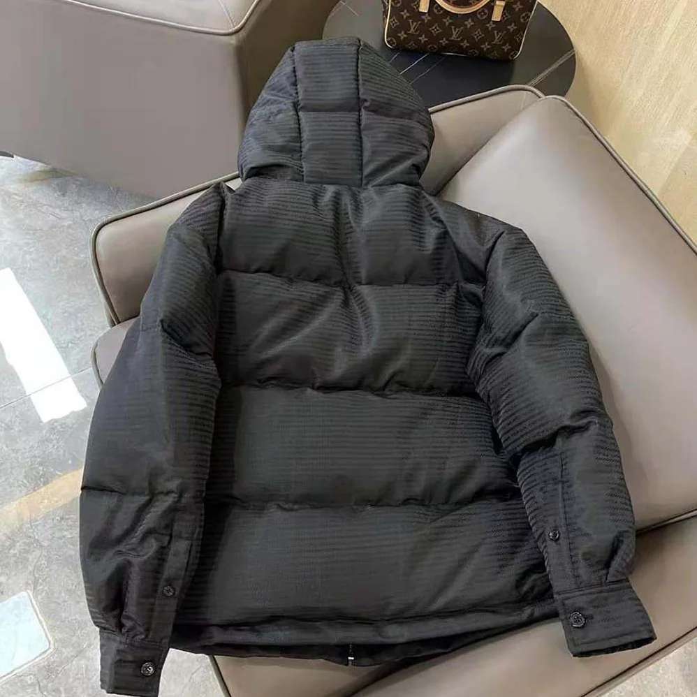 Prada Re-Nylon Hooded Down Jacket for Men in Black Prada Re-Nylon Hooded Down Jacket for Men in Black