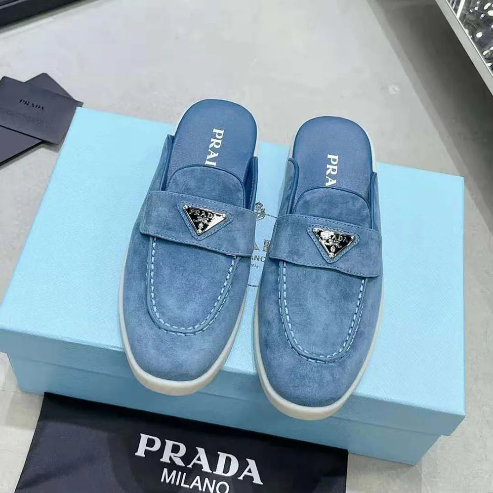 Prada Suede Sabots with the Enameled Metal Triangle Logo for Men