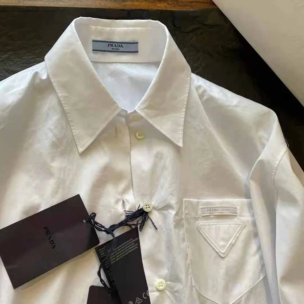 Prada Puffy Sleeve Poplin Blouse for Women in White Prada Puffy Sleeve Poplin Blouse for Women in White