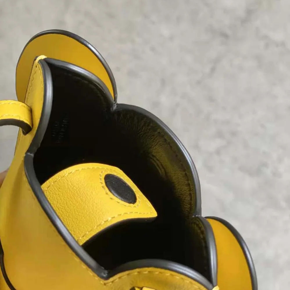 Loewe Elephant Pocket in Classic Calfskin for Women in Yellow Loewe Elephant Pocket in Classic Calfskin for Women in Yellow