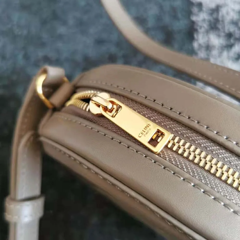 Celine Crossbody Oval Purse Cuir Triomphe in Smooth Calfskin for Women in Silver Celine Crossbody Oval Purse Cuir Triomphe in Smooth Calfskin for Women in Silver