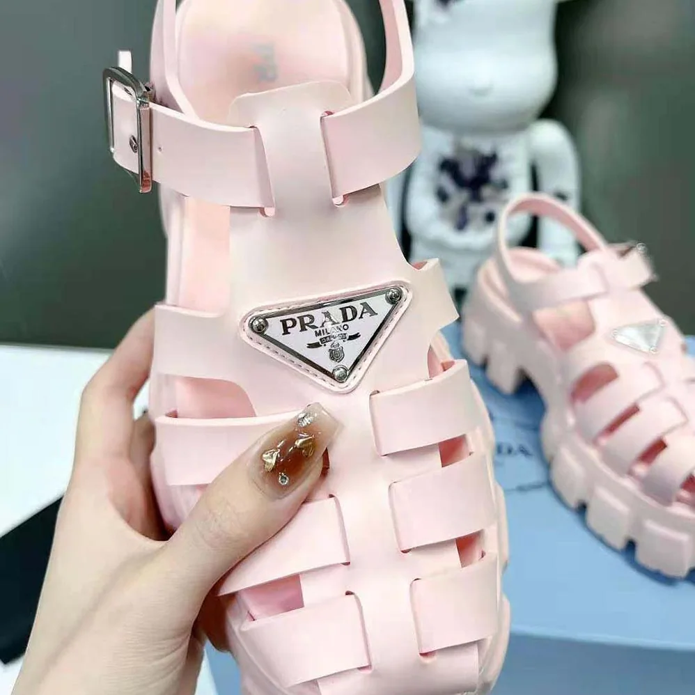 Prada Foam Rubber Sandals with Enameled Metal Triangle Logo for Women in Pink