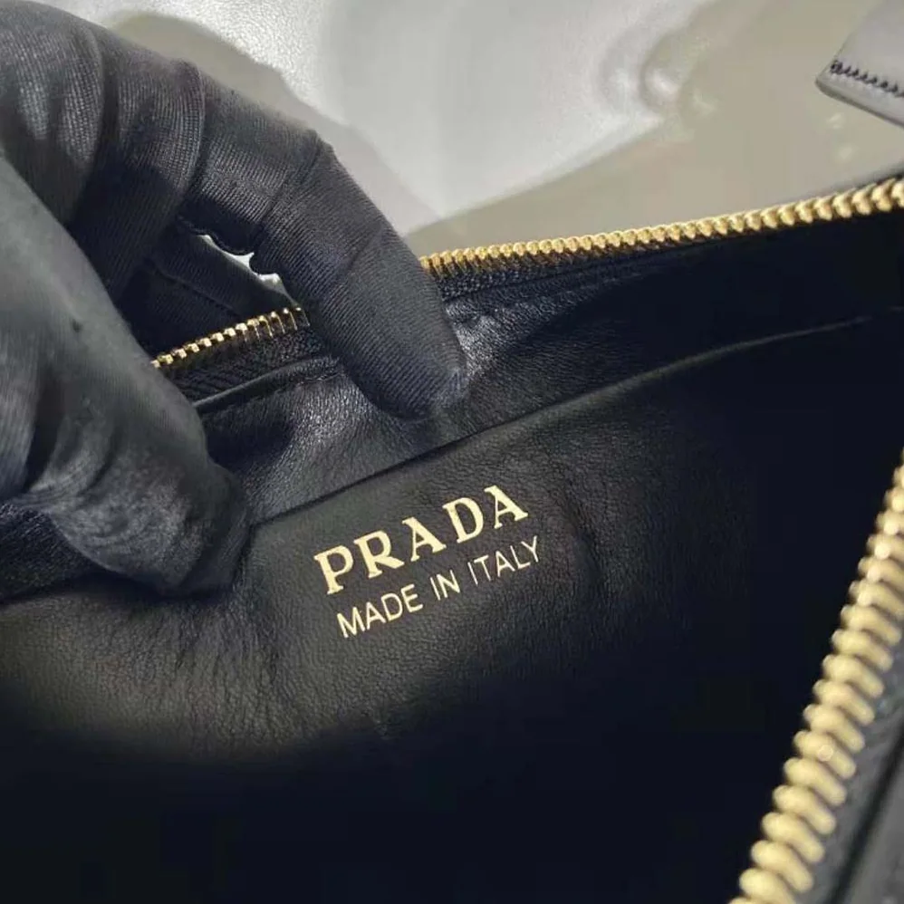 Prada Leather Shoulder Bag with Enameled Metal Triangle Logo for Women in Black