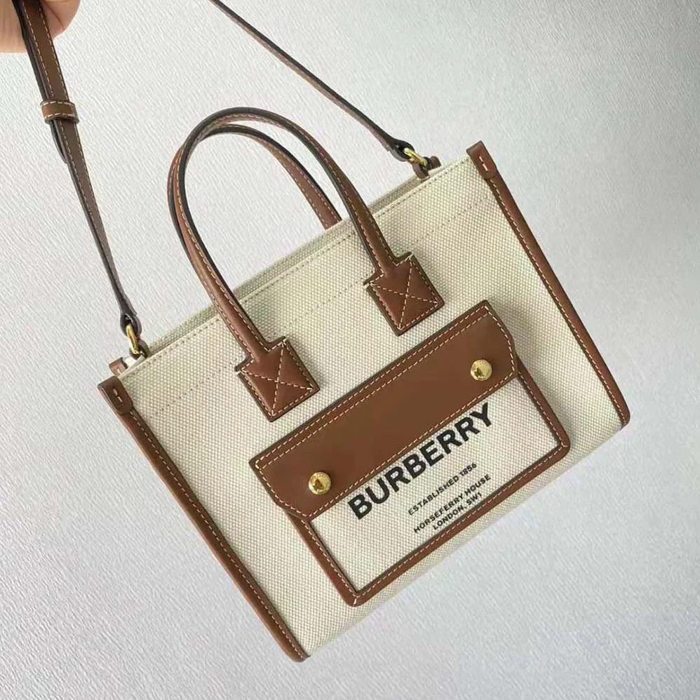 Burberry Mini Two-tone Canvas and Leather Freya Bag for Women in Brown Burberry Mini Two-tone Canvas and Leather Freya Bag for Women in Brown