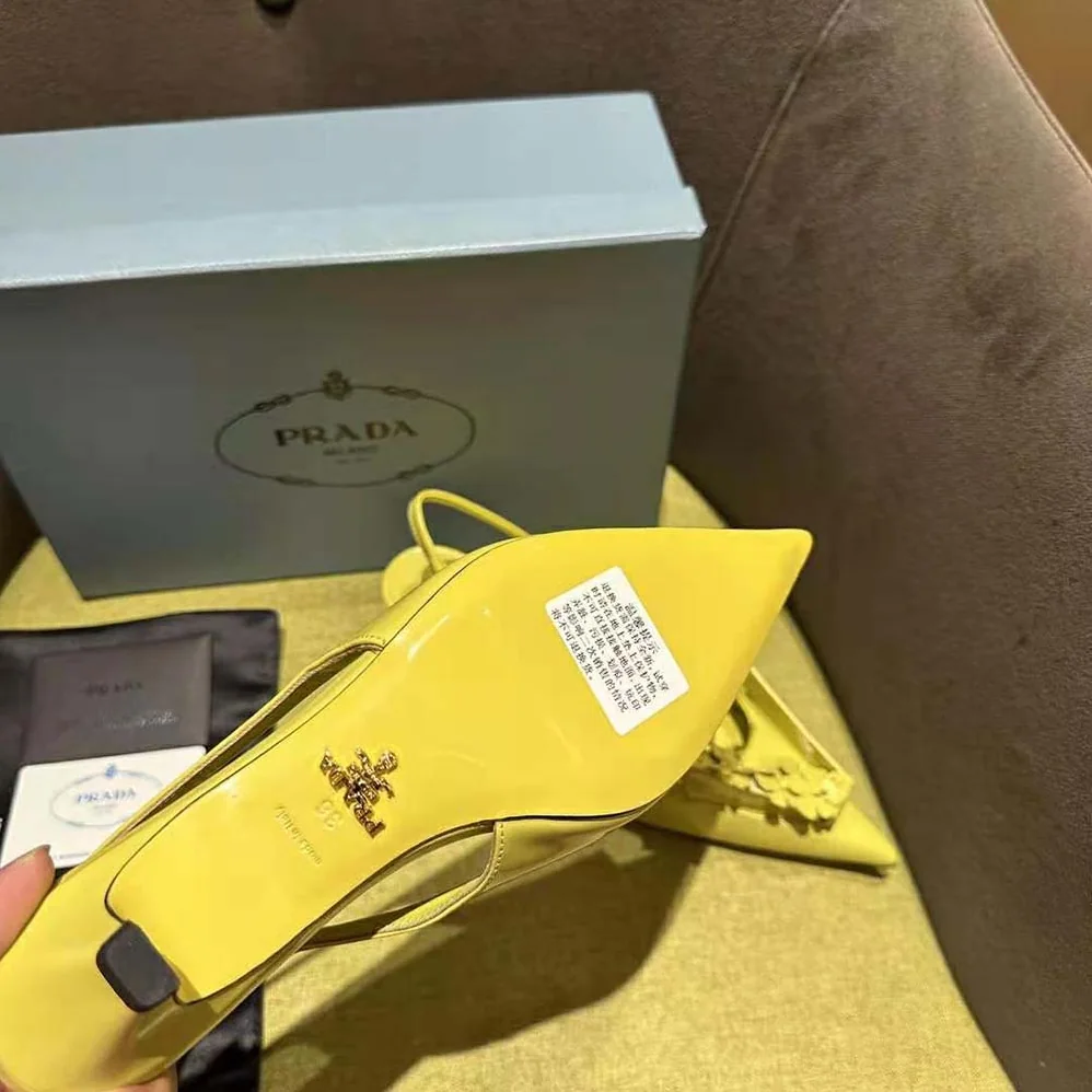 Prada Brushed Leather Slingback Pumps with Floral Appliques for Women in Yellow