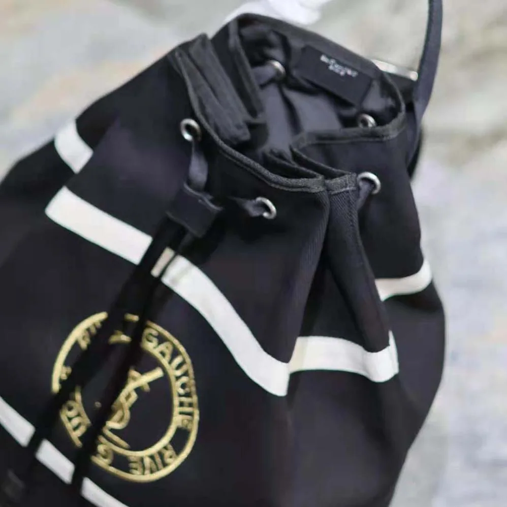 Saint Laurent YSL Rive Gauche Sling Bag in Canvas for Men in Black