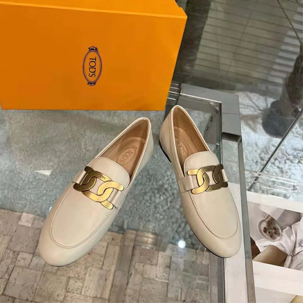 TODS Kate Loafers in Leather with A Metal Branded for Women in White TODS Kate Loafers in Leather with A Metal Branded for Women in White