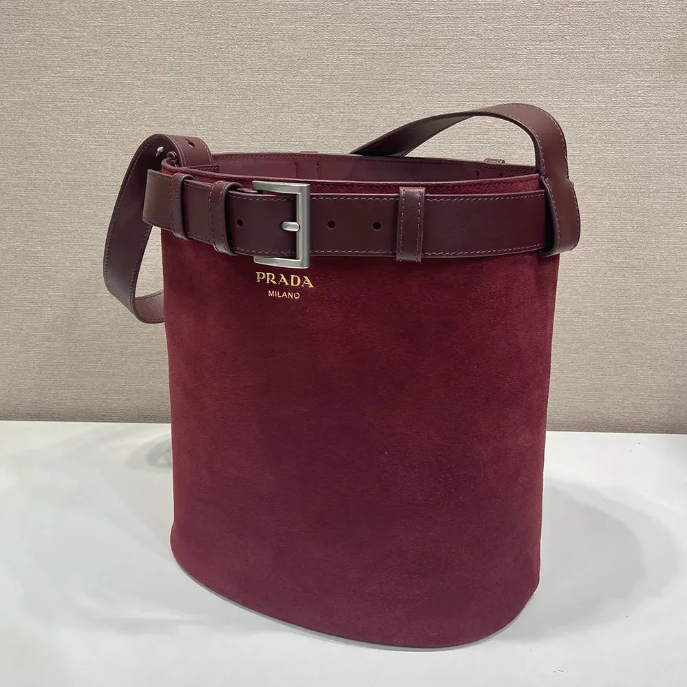 Prada Buckle Belted Suede Bucket Bag for Women in Burgundy Prada Buckle Belted Suede Bucket Bag for Women in Burgundy