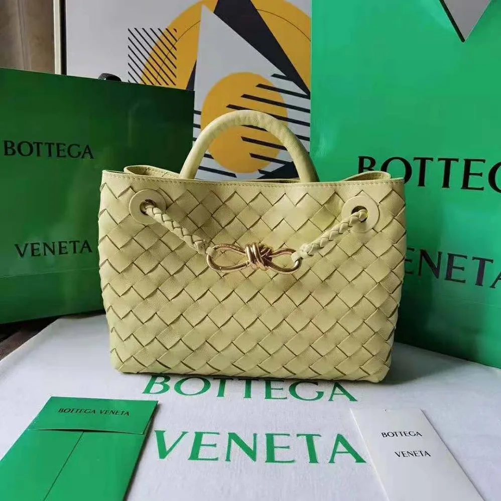 Bottega Veneta Small Andiamo Intrecciato Leather Top Handle Bag for Women in Yellow