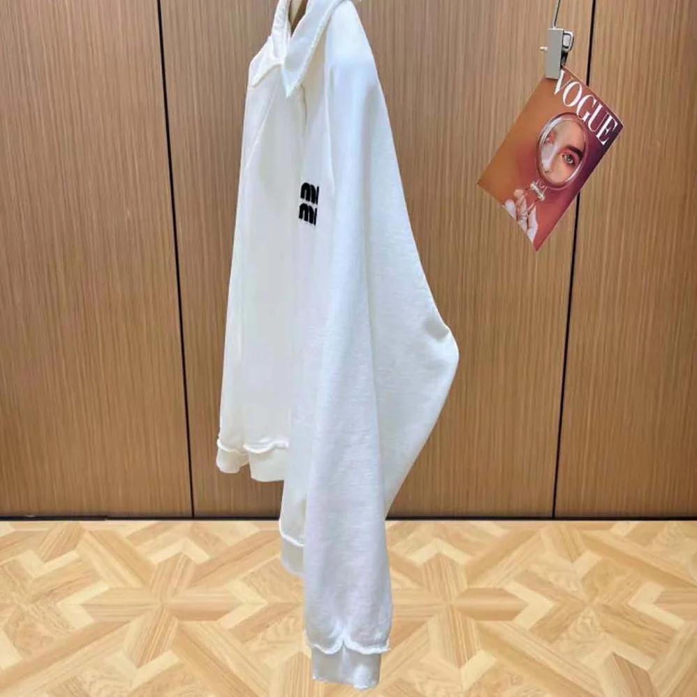 Miu Miu Cotton Polo Sweatshirt with Embroidered Logo for Women in White Miu Miu Cotton Polo Sweatshirt with Embroidered Logo for Women in White