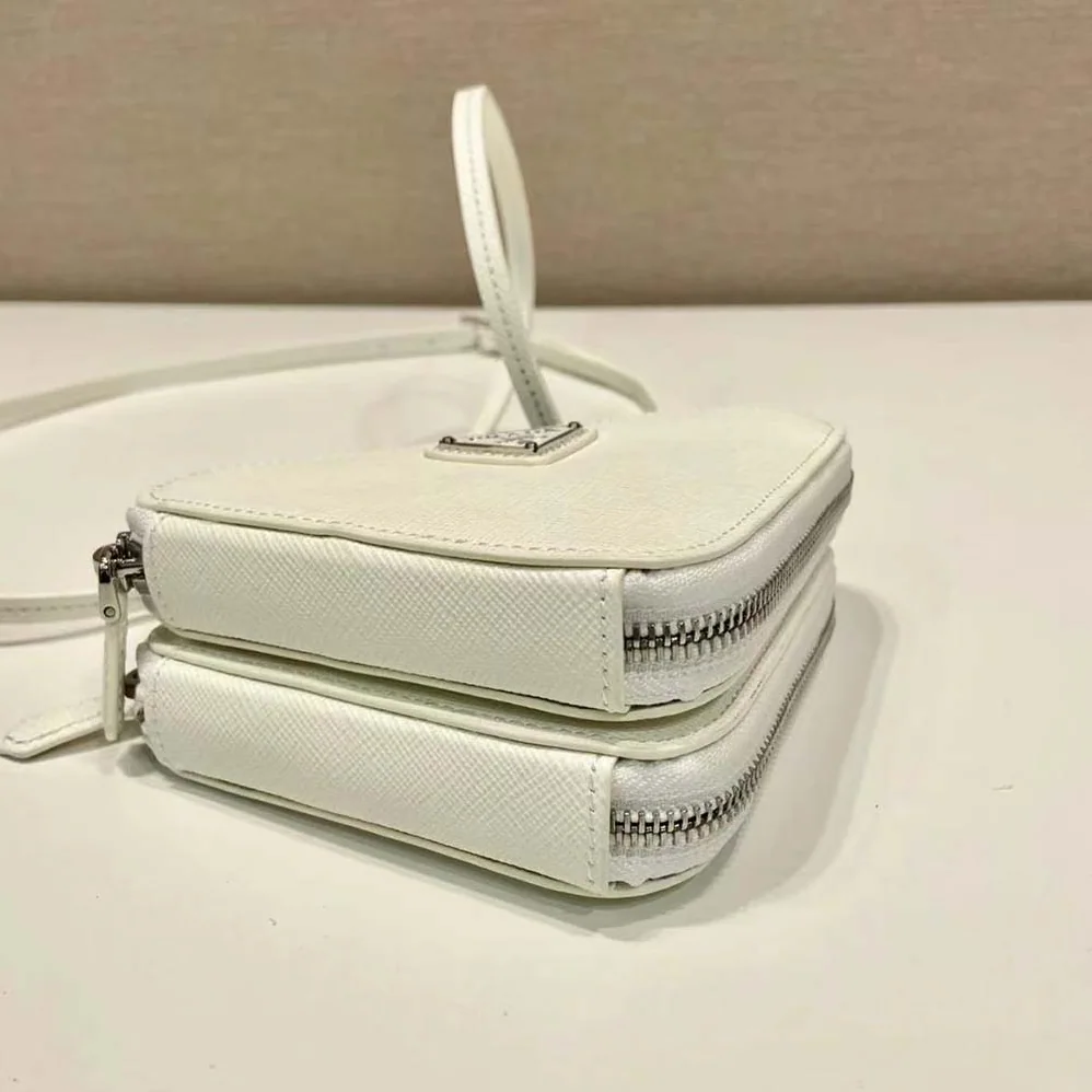 Prada Saffiano Leather Mini Pouch for Unisex in White Prada Saffiano Leather Mini Pouch for Unisex in White