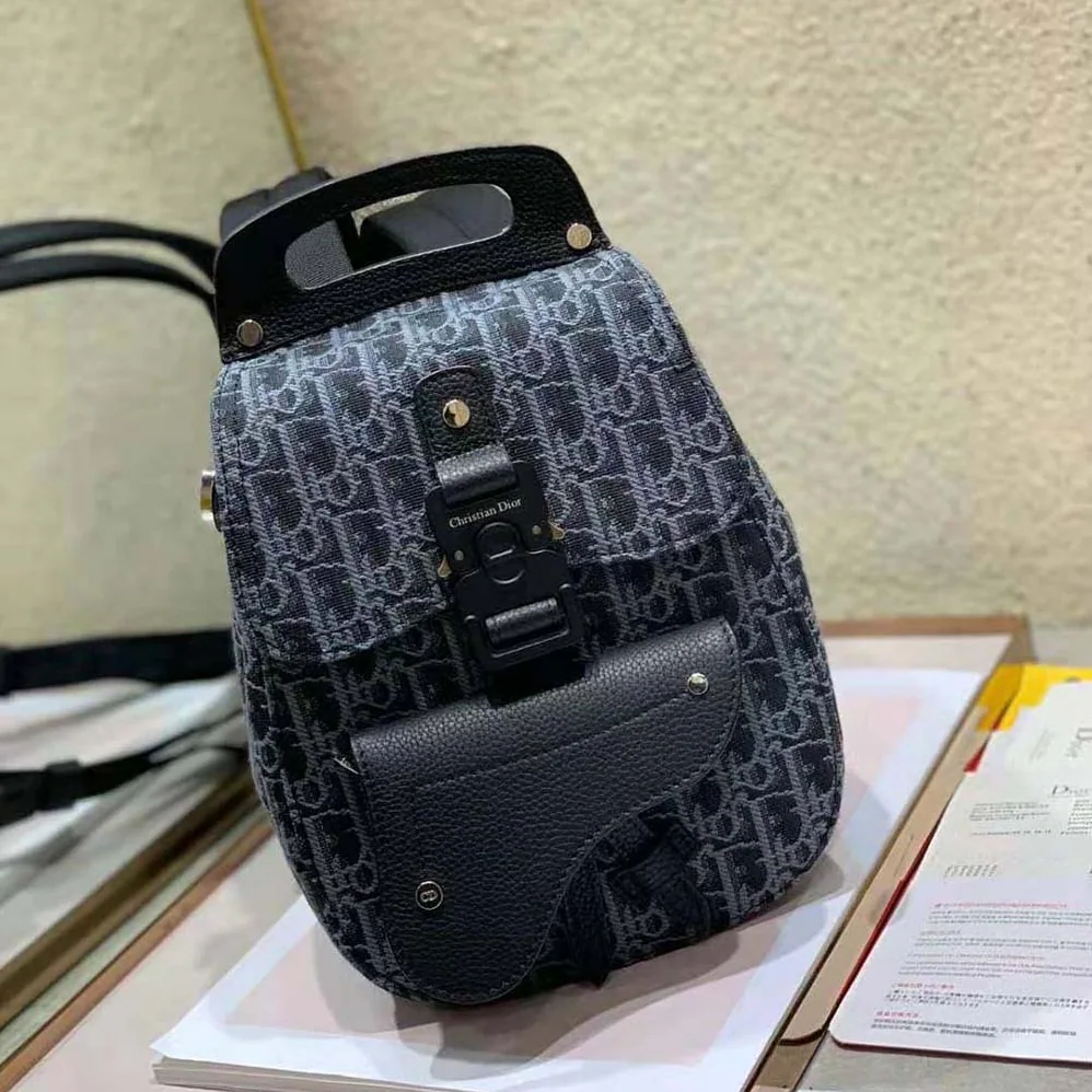 Dior Mini Saddle Backpack Dior Oblique Jacquard for Men in Black Dior Mini Saddle Backpack Dior Oblique Jacquard for Men in Black
